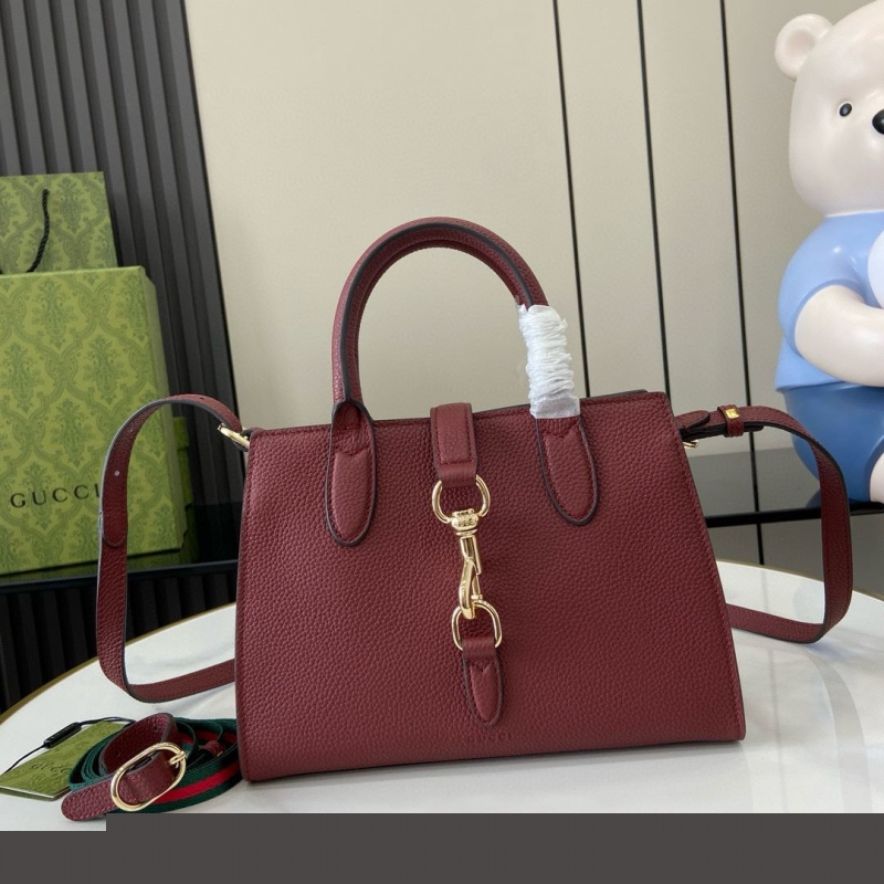 G*u*i top handle bags